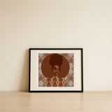 Confident Afro Woman — framed, leaning against the wall thumbnail