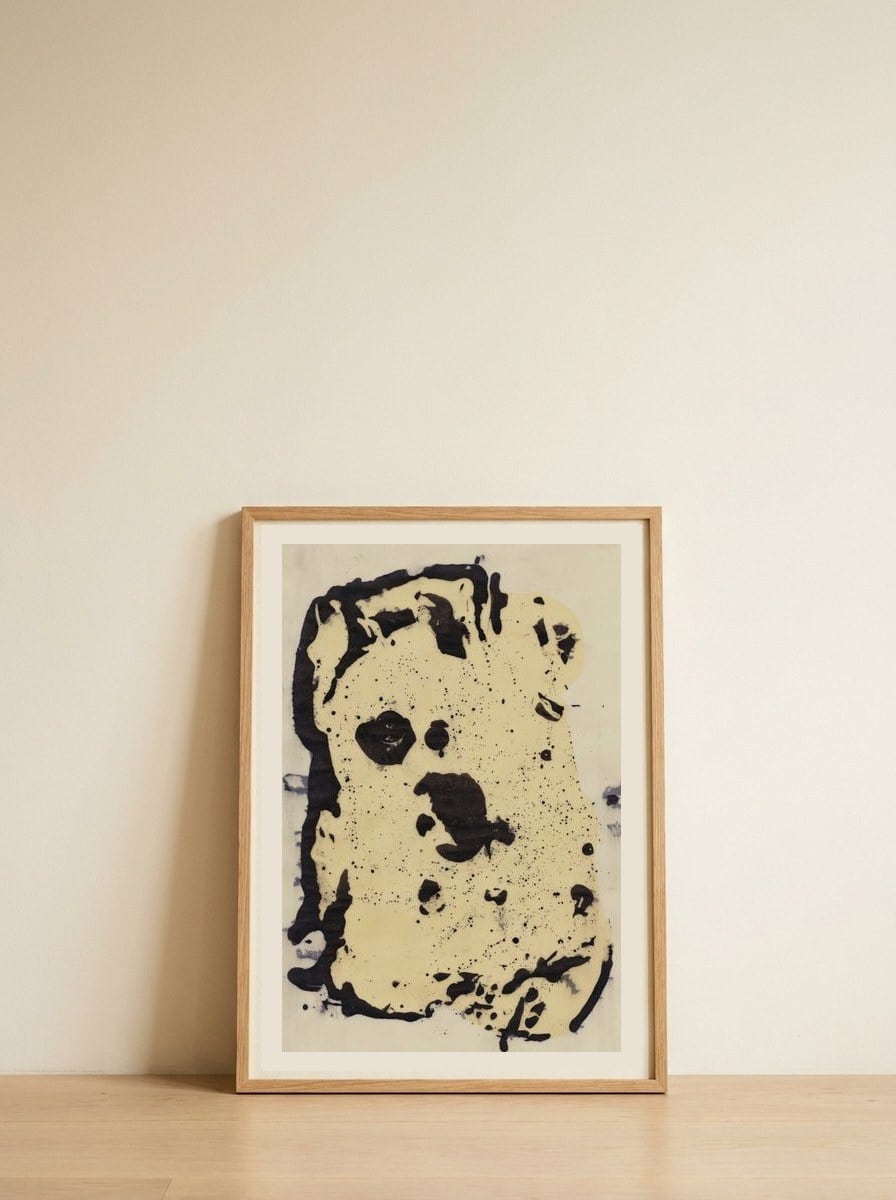 Koala — framed, leaning against the wall