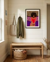 Vibrant Afrocentric Woman framed in a relaxed room thumbnail