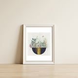 Flowers and leaves in a simple basket — framed, leaning against the wall thumbnail