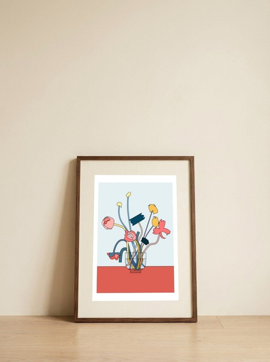 Flowers in a glass vase — framed, leaning against the wall