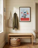 Flowers in a glass vase framed in a relaxed room thumbnail