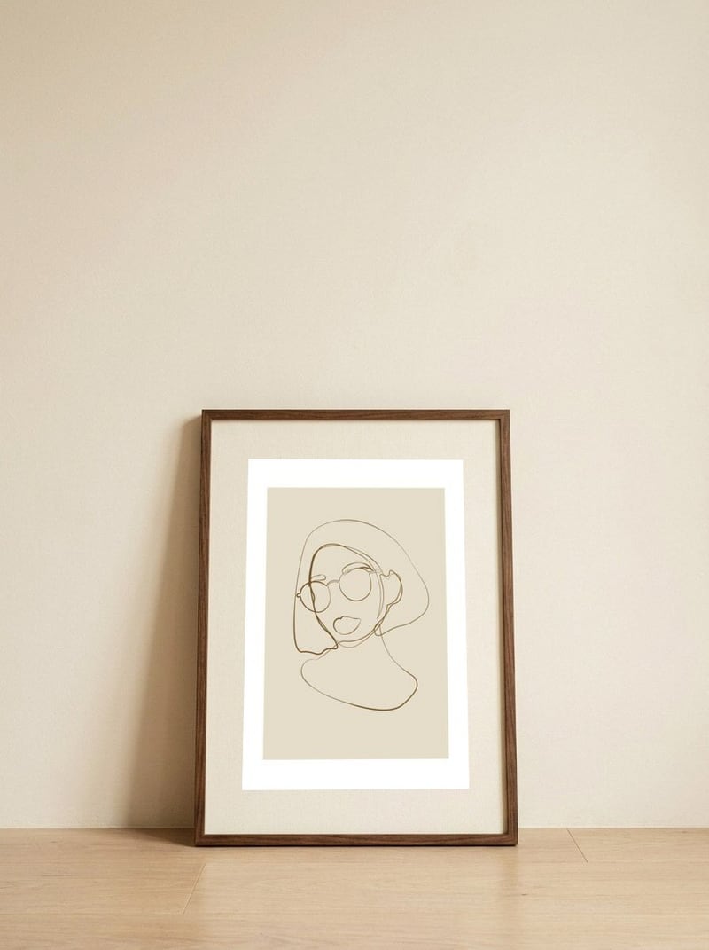 Female portrait — framed, leaning against the wall