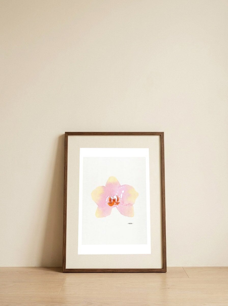 Watercolor Pink Orchid — framed, leaning against the wall