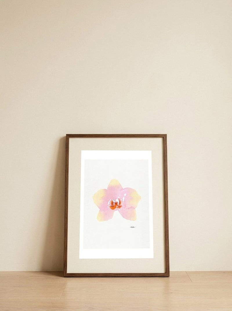 Watercolor Pink Orchid — framed, leaning against the wall
