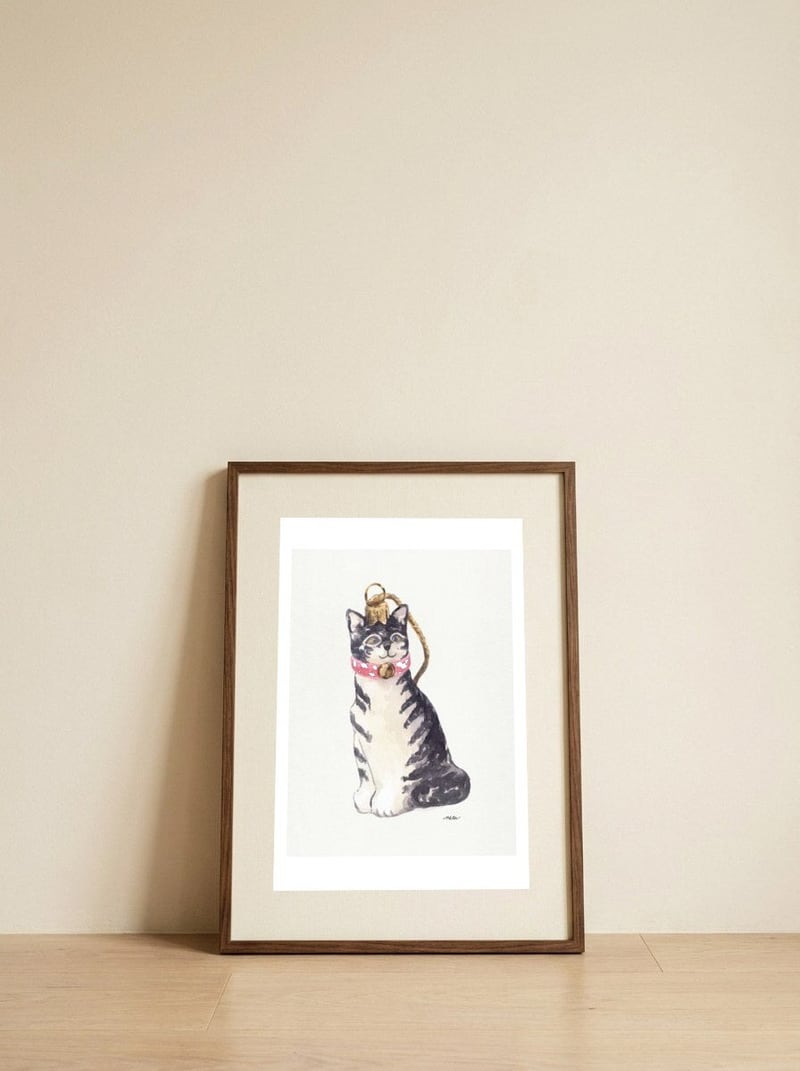 Cute Tabby Ornament — framed, leaning against the wall