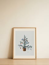 Potted Festive Christmas Tree — framed, leaning against the wall thumbnail