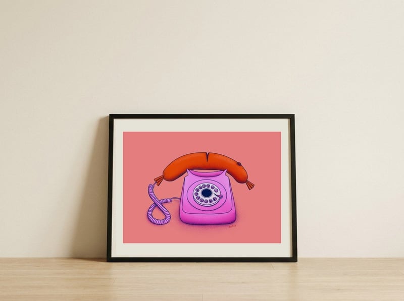 Whimsical Sausage Phone — framed, leaning against the wall