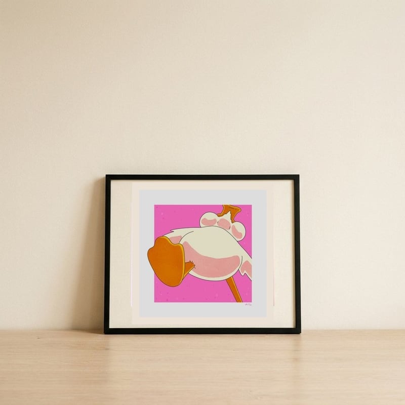 Playful Duck Crown — framed, leaning against the wall