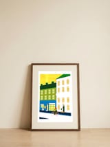 Vibrant Urban Cycling — framed, leaning against the wall thumbnail