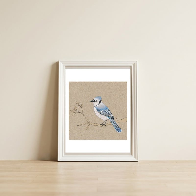 Blue jay — framed, leaning against the wall