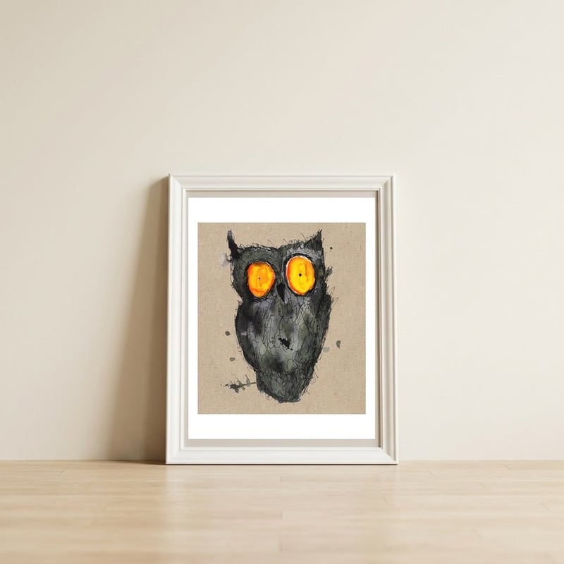 Scary owl — framed, leaning against the wall