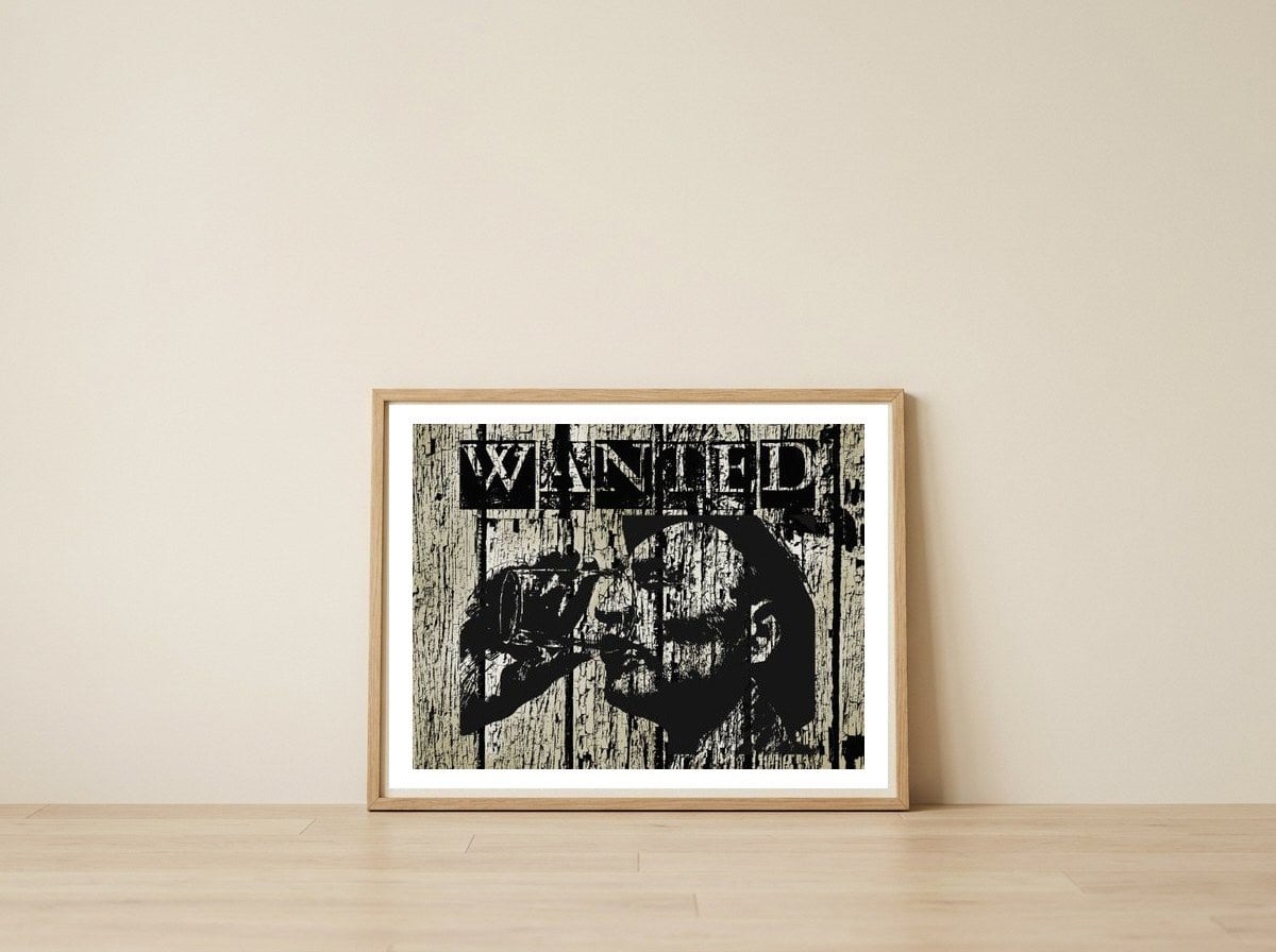 Wanted — framed, leaning against the wall