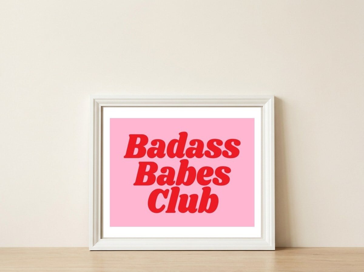 Badass Babes Club — framed, leaning against the wall