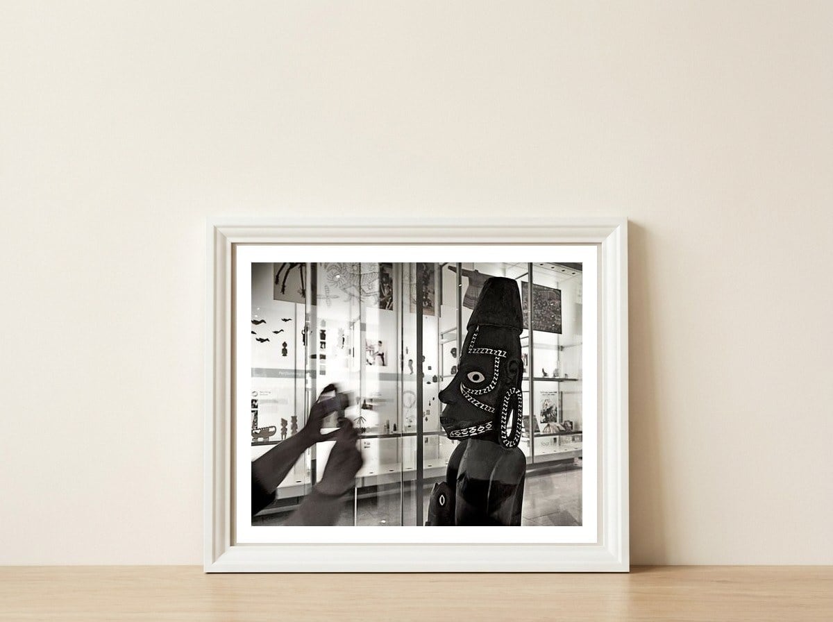 Smile please! — framed, leaning against the wall