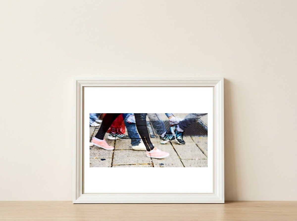 Shopping feet — framed, leaning against the wall