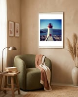 Red and white lighthouse framed in a tender room thumbnail