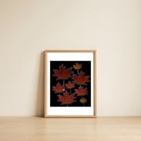 Red Autumn Leaves on Black Ground. — framed, leaning against the wall thumbnail