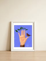 One Earth — framed, leaning against the wall thumbnail